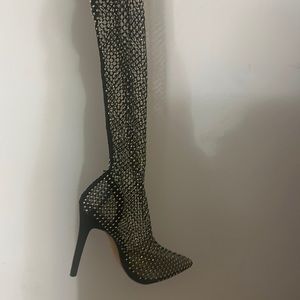 Thigh high beaded boots. Worn once.